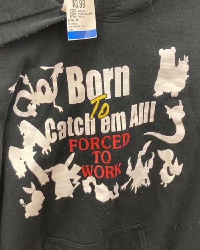 Weird-Shirts: Black hoodie with "Born to catch 'em all, forced to work" design, featuring various character silhouettes.