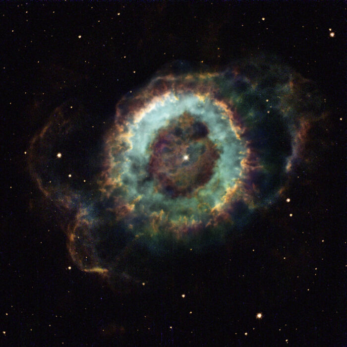 "Amazing nebula with a colorful halo structure in deep space."