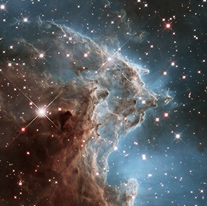 Amazing nebula with bright stars and cosmic dust formations, showcasing vibrant colors and intricate details in space.