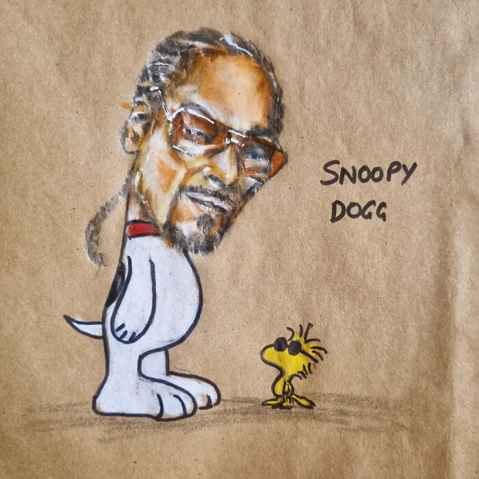 Cartoon of Snoopy with Snoop Dogg's face drawn on a lunch bag, showcasing creative humor.