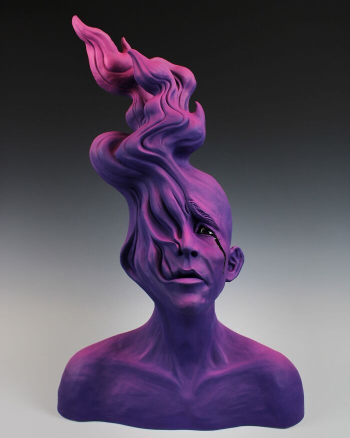 Surreal ceramic art piece with a purple abstract human bust, depicting emotion through flowing shapes.