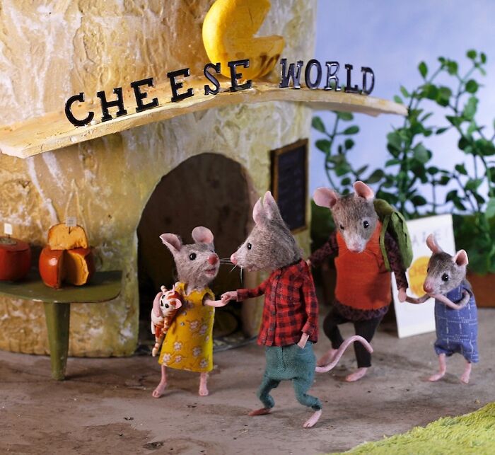 Miniature mice family visiting Cheese World, part of Maggie Rudy’s charming Mouseland diorama.