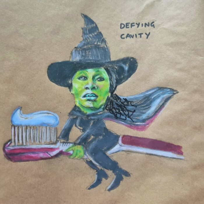 Cartoon of a witch with green face riding a toothbrush, titled "Defying Cavity," drawn on a lunch bag.