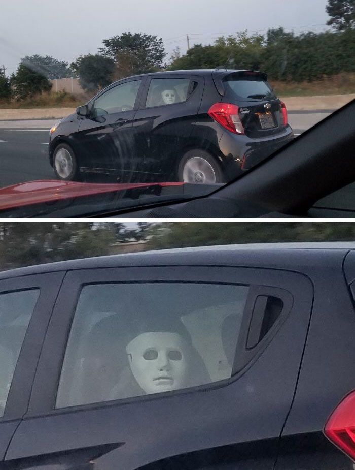 Saw A Person On The Highway Who Fastened A Mask To The Corner Of Their Headrest