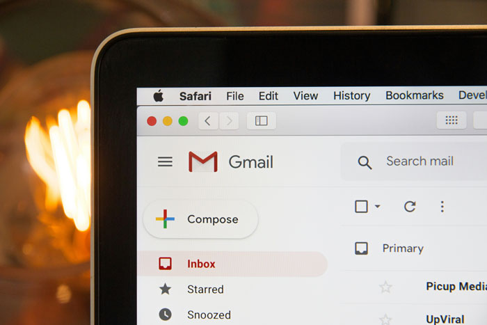 Gmail inbox on a laptop screen, relevant to stories of being fired.