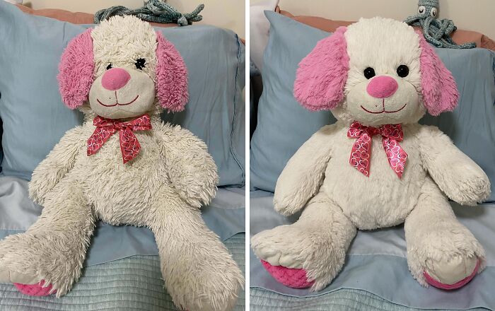 Restored pink-eared stuffed dog with new fluffy fur and vibrant bow on a bed, highlighting restoration work.