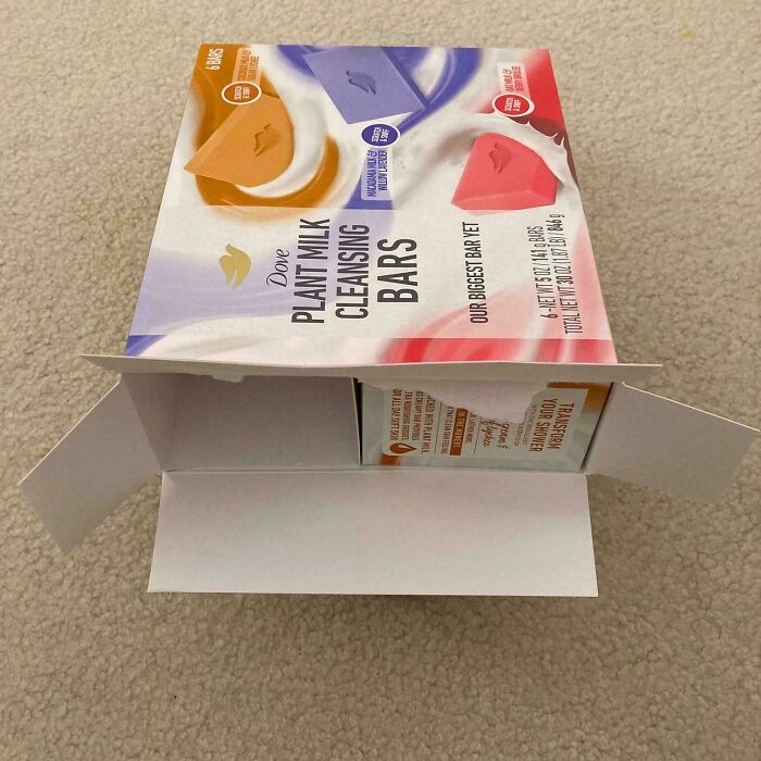 Misleading packaging of plant milk cleansing bars with a large box and smaller product inside.