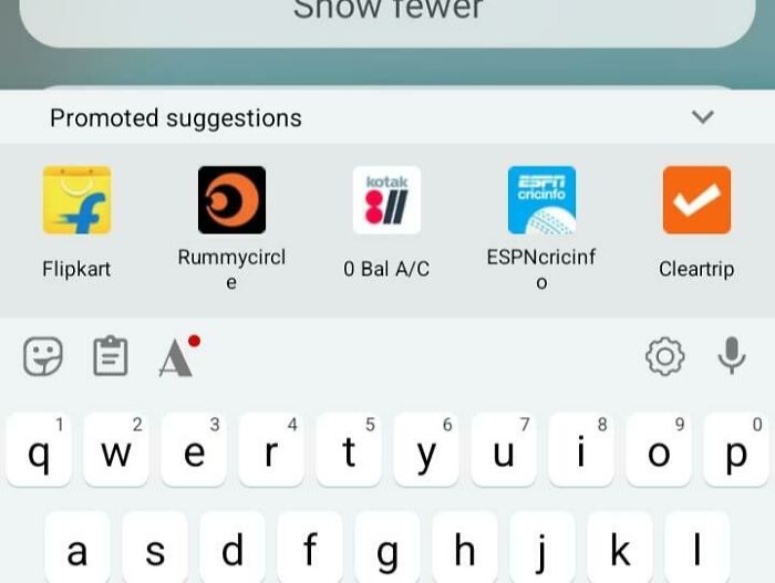 Keyboard with promoted suggestions, highlighting deceptive-marketing-techniques in mobile apps.