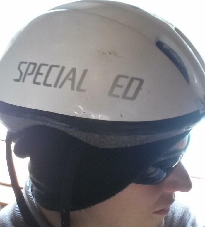 Person wearing sunglasses and a helmet labeled "SPECIAL ED," related to hilarious in-laws theme.