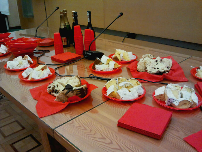 Table with snacks and drinks arranged with red napkins, symbolizing good-funny-bosses' hospitality.