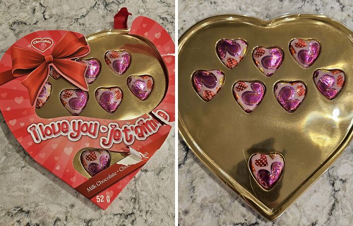 Heart-shaped box with misleading packaging design, showing fewer chocolates than expected.