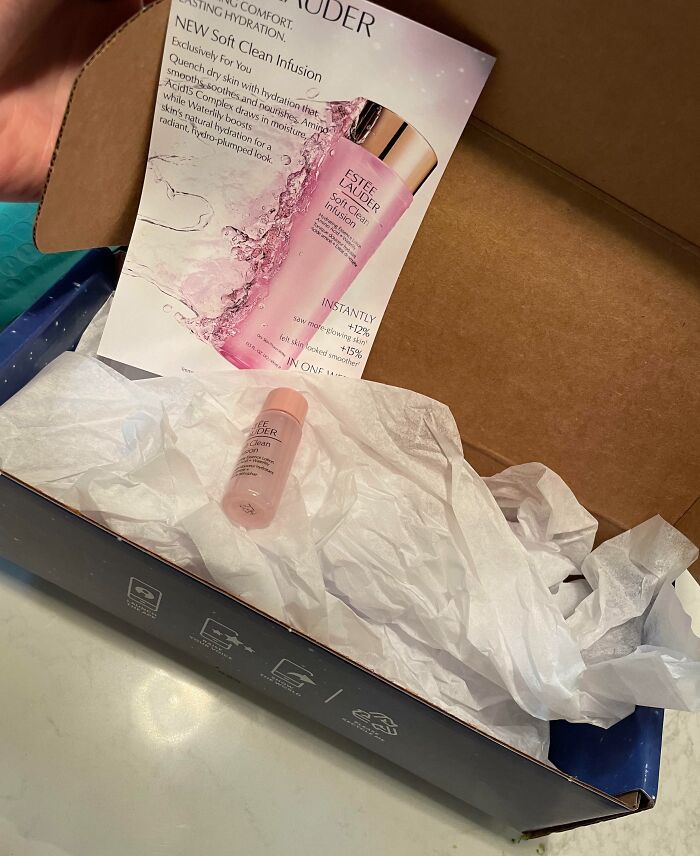 Misleading packaging design showing a large box for a small Estee Lauder product inside.