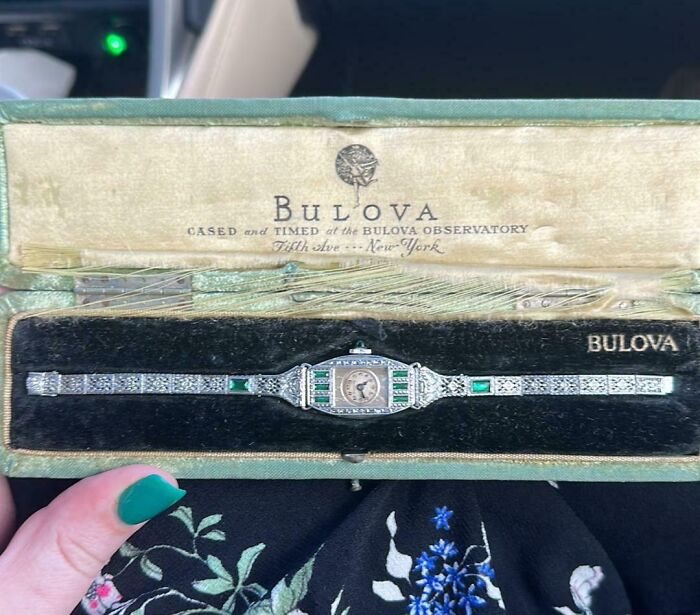 Bulova watch in original box, featuring intricate diamond and emerald design, part of a cool inheritance collection.