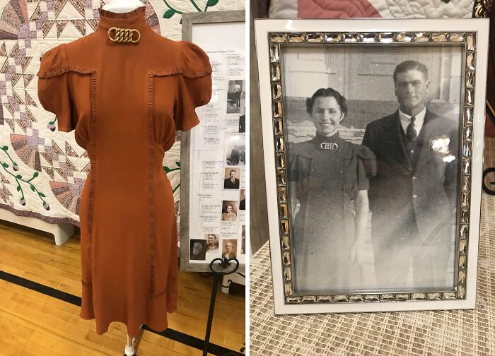 Vintage dress and framed photo of a couple, showcasing a unique inheritance on display.