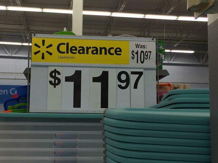 Clearance sign showing deceptive marketing technique with current price higher than original.