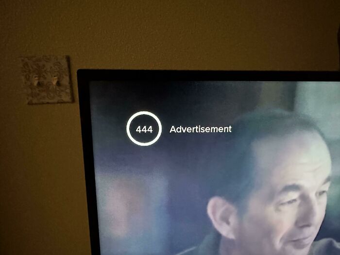 TV shows 444 advertisement, highlighting deceptive marketing techniques with partial view of a man's face.