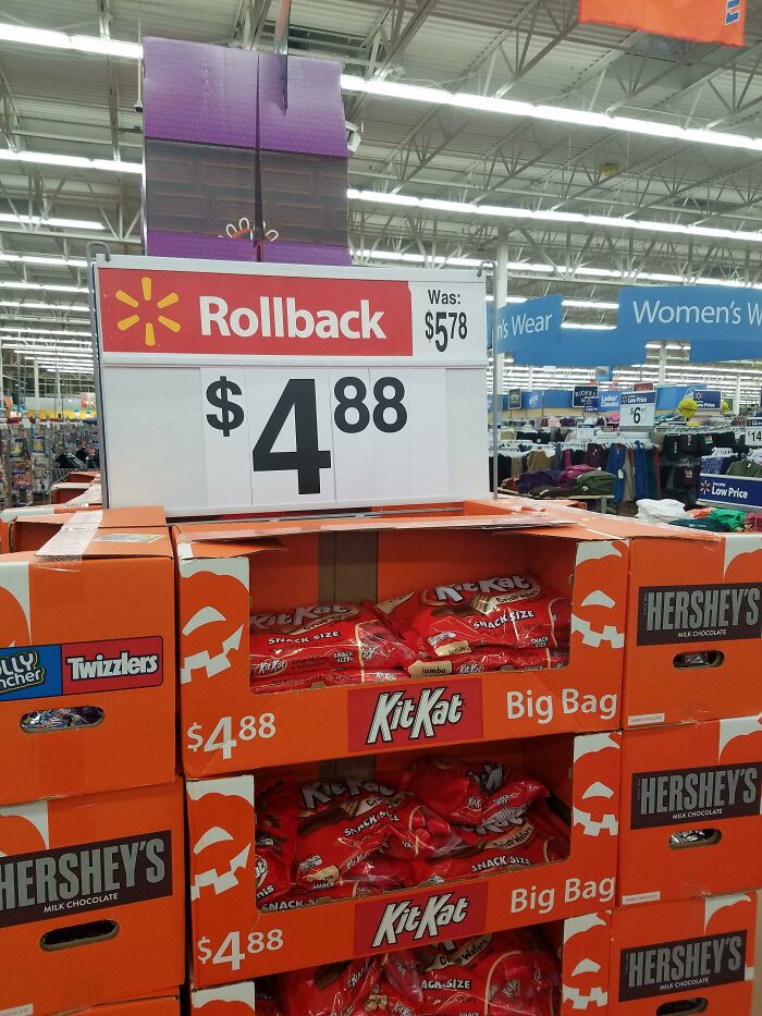 Candy display featuring deceptive marketing techniques with a rollback price from $5.78 to $4.88.