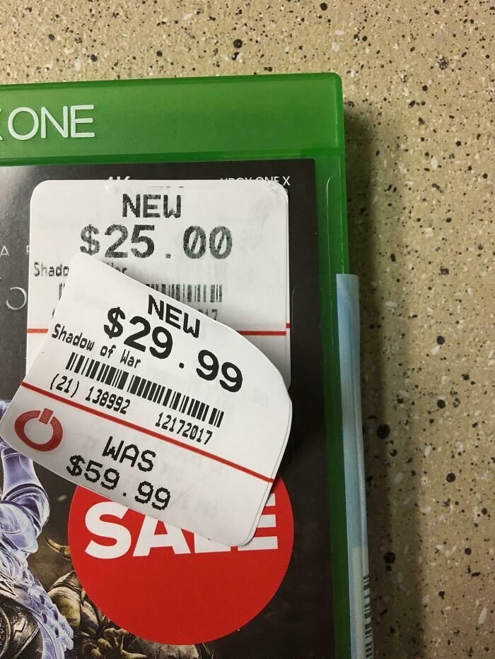 Video game with layered price tags showing deceptive marketing techniques.