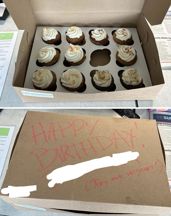 Box of vegan cupcakes with "Happy Birthday" written on the lid, showcasing a good-funny-bosses vibe.