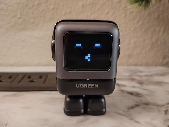 Charging Multiple Devices Just Got A Whole Lot Easier This Black Friday With The Ugreen UNO Charger. This Powerful Charger Keeps All Your Gadgets Powered Up With Multiple USB Ports, All While Giving You A Cute Smile