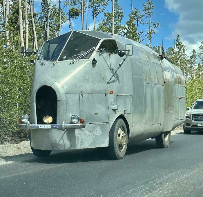 Unusual car design on the road, showcasing one of the car-fails with an angular, metallic exterior.