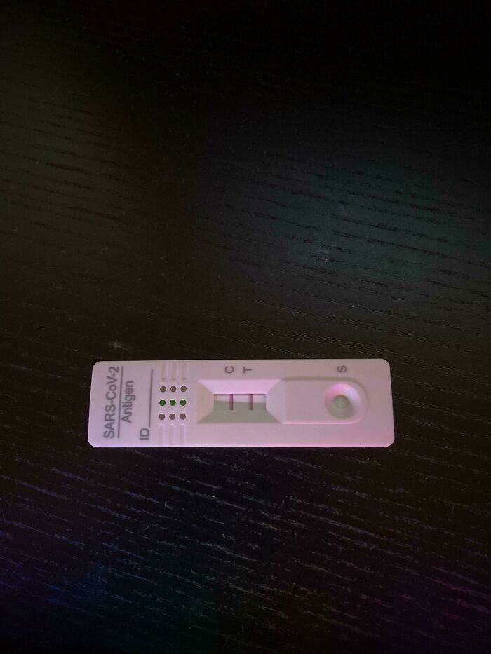 COVID-19 antigen test showing positive result, representing a potential Christmas accident.