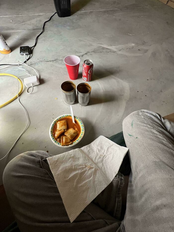 Floor scattered with cups, a soda can, and Christmas dinner mishap, possibly reflecting accidents on a bad day.