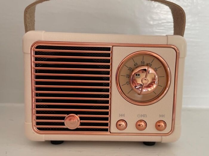 Retro-style radio with copper accents, a unique option among gifts for teens.