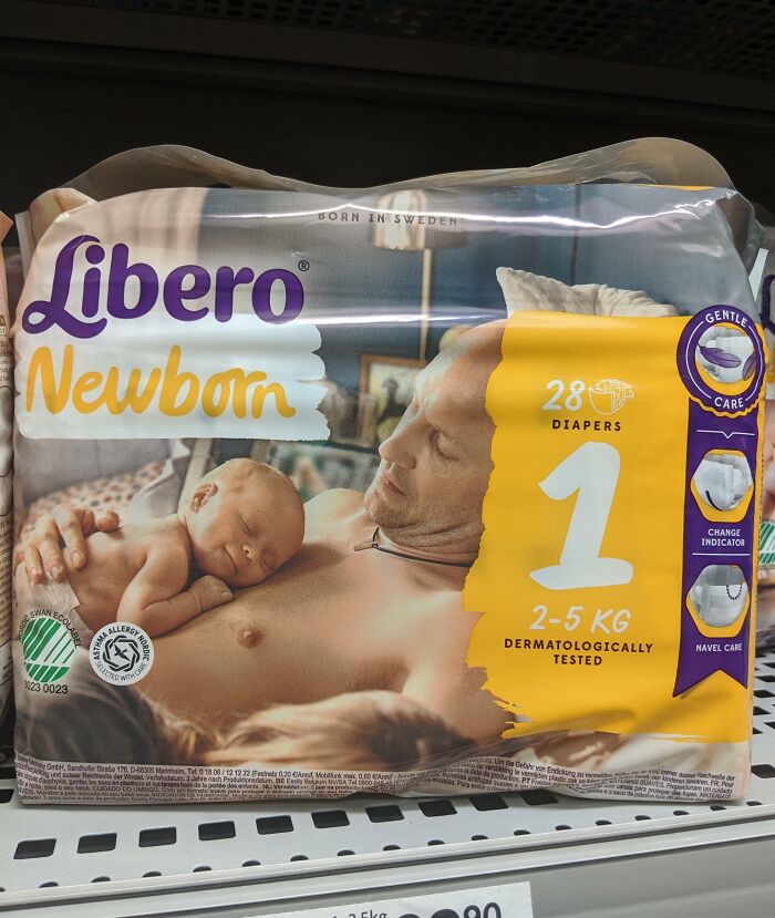 Libero Newborn diapers package featuring a peaceful sleeping infant, with dermatologically tested label in a store aisle.