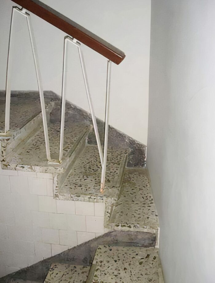 Staircase ending abruptly at a wall, highlighting a questionable engineering decision.