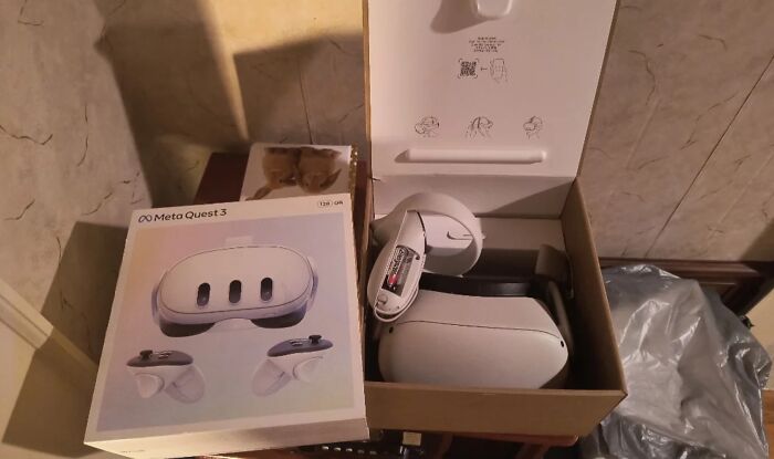 Box of Meta Quest 3 headset opened on table, possibly a Christmas accident.