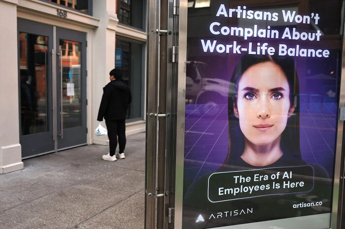 AI-themed ad in urban setting, highlighting dystopian work-life balance concept.