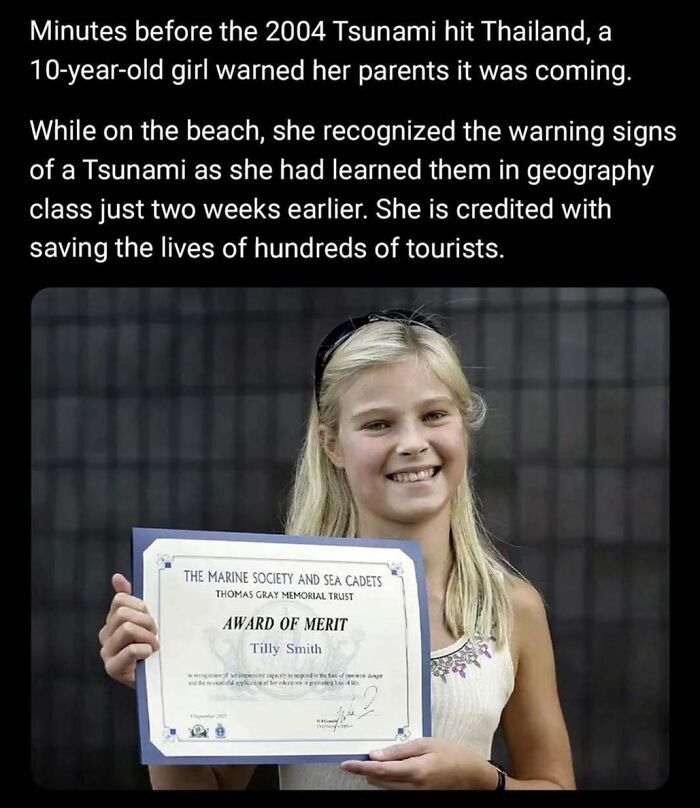 Girl holding an Award of Merit certificate, honored for her quick action during the 2004 tsunami. Wholesome kindness moment.