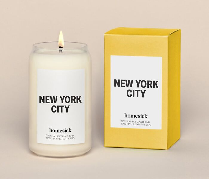 New York City scented candle by Homesick with matching yellow box, featured in lesser-known online shopping spots.