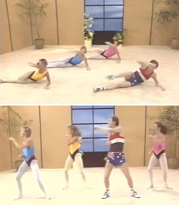 Group of people in 80s gym wear doing fitness exercises in a studio with plants and large window.