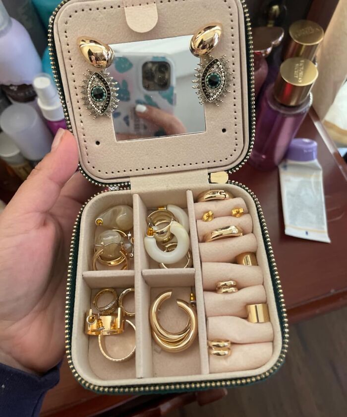 Compact jewelry box with earrings and rings, an ideal budget gift option.