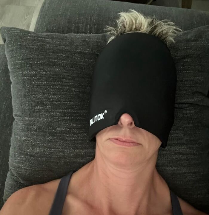 Person lying down with face covered by a black sleep mask, suitable for last minute budget gifts.