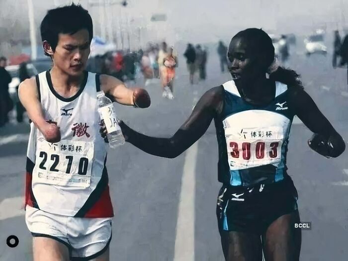 Two marathon runners supporting each other, illustrating learning from the past to shape the future in sportsmanship.