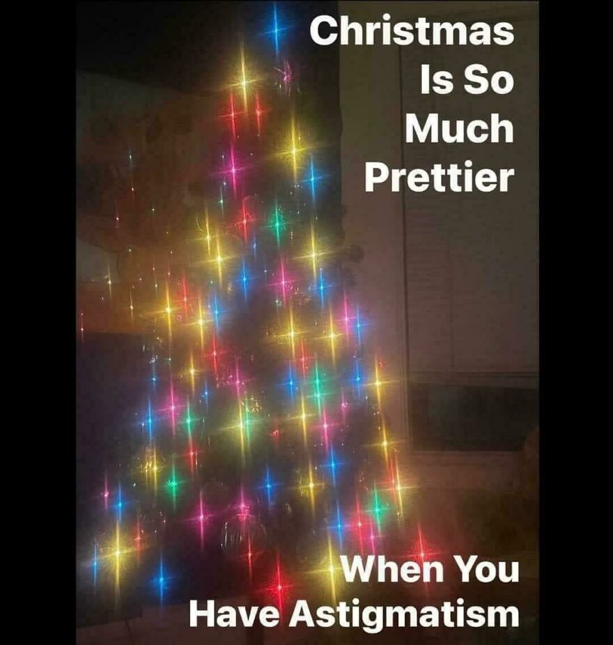 Funny Christmas meme with a blurry Christmas tree lit by colorful lights, captioned "Christmas Is So Much Prettier with Astigmatism."