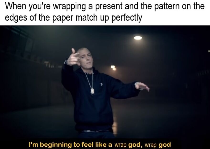 Man striking a pose in a dark room with funny Christmas meme text about perfectly wrapping presents.