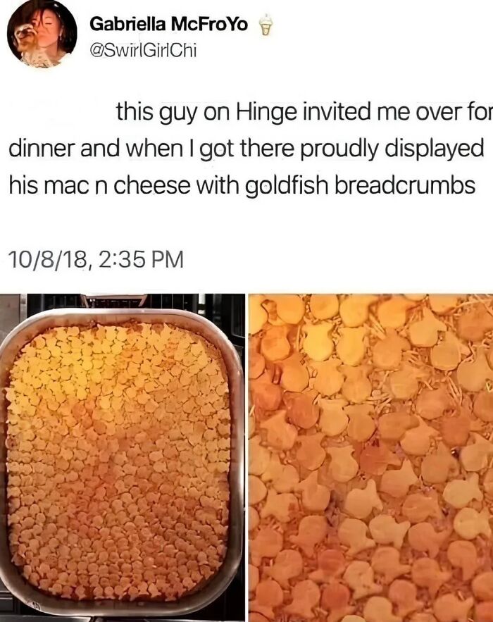 Baked mac n cheese with Goldfish crackers as topping in a large pan, showing an unusual and creative dish presentation.