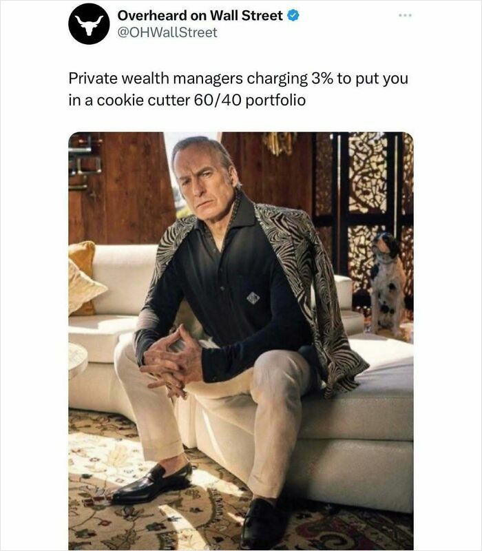 Man in a stylish outfit sitting on a couch, embodying Wall Street meme humor about wealth management fees and portfolio setup.