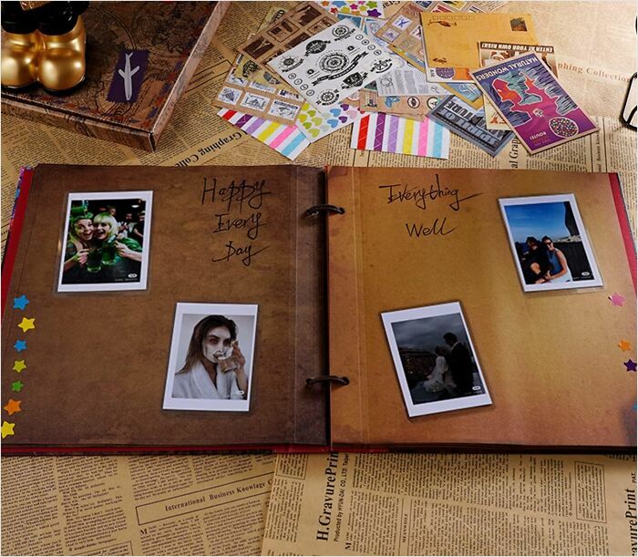 Scrapbook with photos and decorative stickers, laid out on vintage newspaper, representing coolest things we covet.