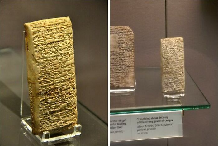 Ancient clay tablets in a museum display showcasing rare historical facts and inscriptions.