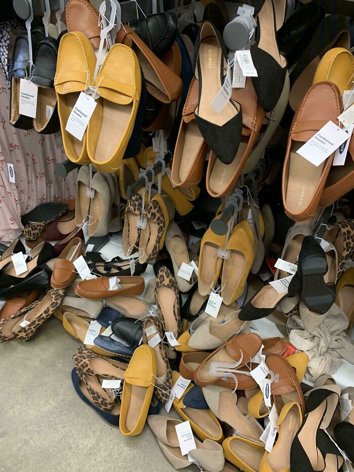 Disorganized shoe rack with various loafers scattered, illustrating lazy individuals' shopping habits.