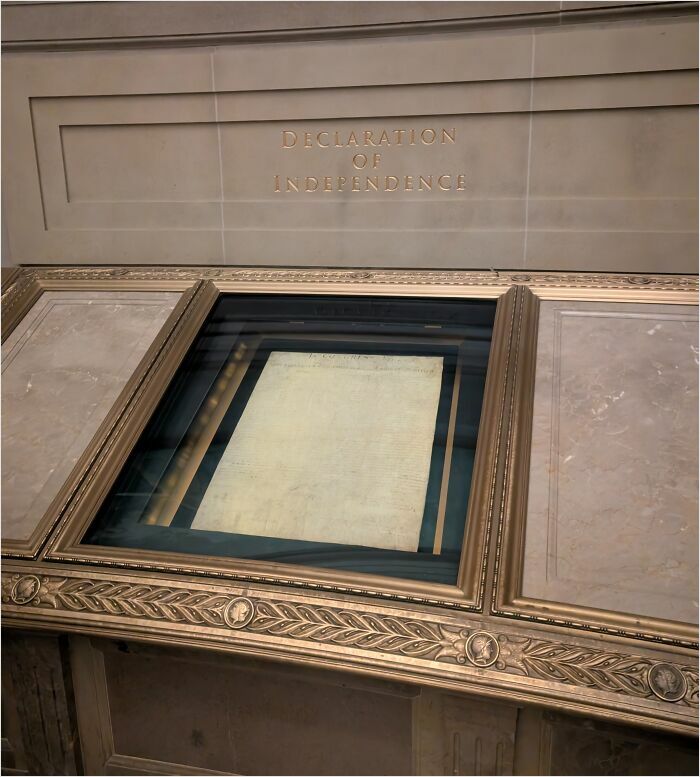 Declaration of Independence on display, highlighting its historical influence.