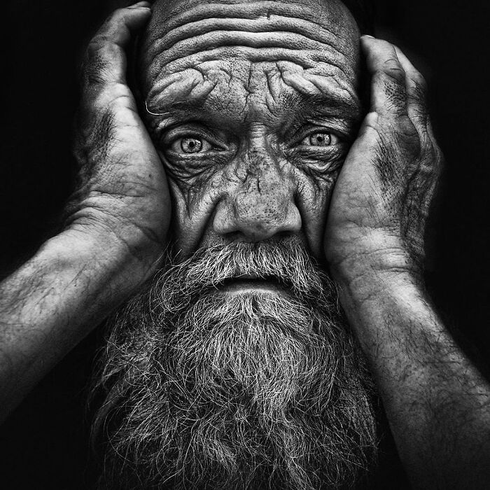 Soulful portrait of an elderly man with a beard, captured in black and white by Lee Jeffries.