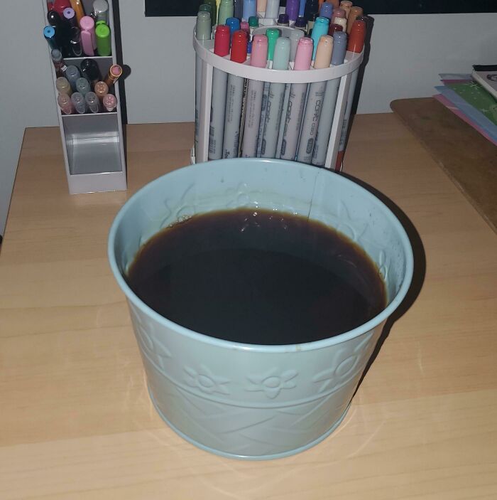 A Liter Of Black Tea In A Bucket