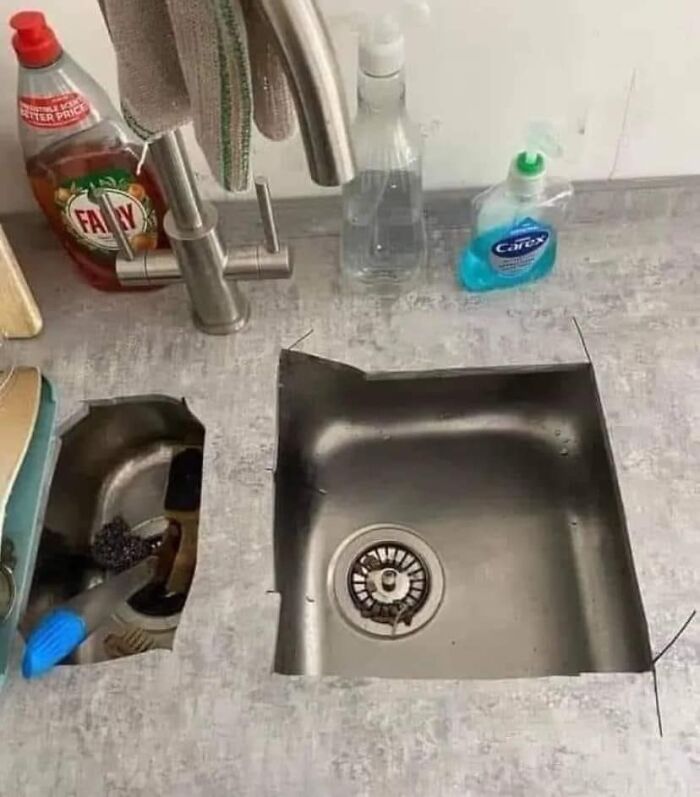 Poorly installed kitchen sink illustrating a funny cheap construction fail.