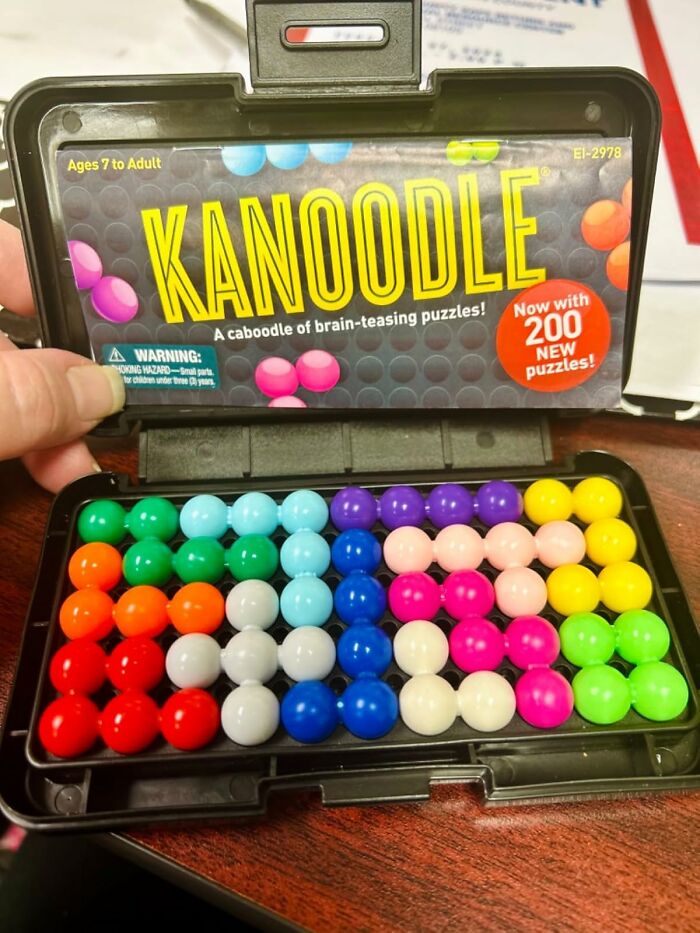 Puzzle Your Way To Fun With The Kanoodle 3D Brain Teaser And Let Your Kids Tackle Over 200 Challenges. It's A Great Way To Boost Spatial Reasoning And Critical Thinking Skills!